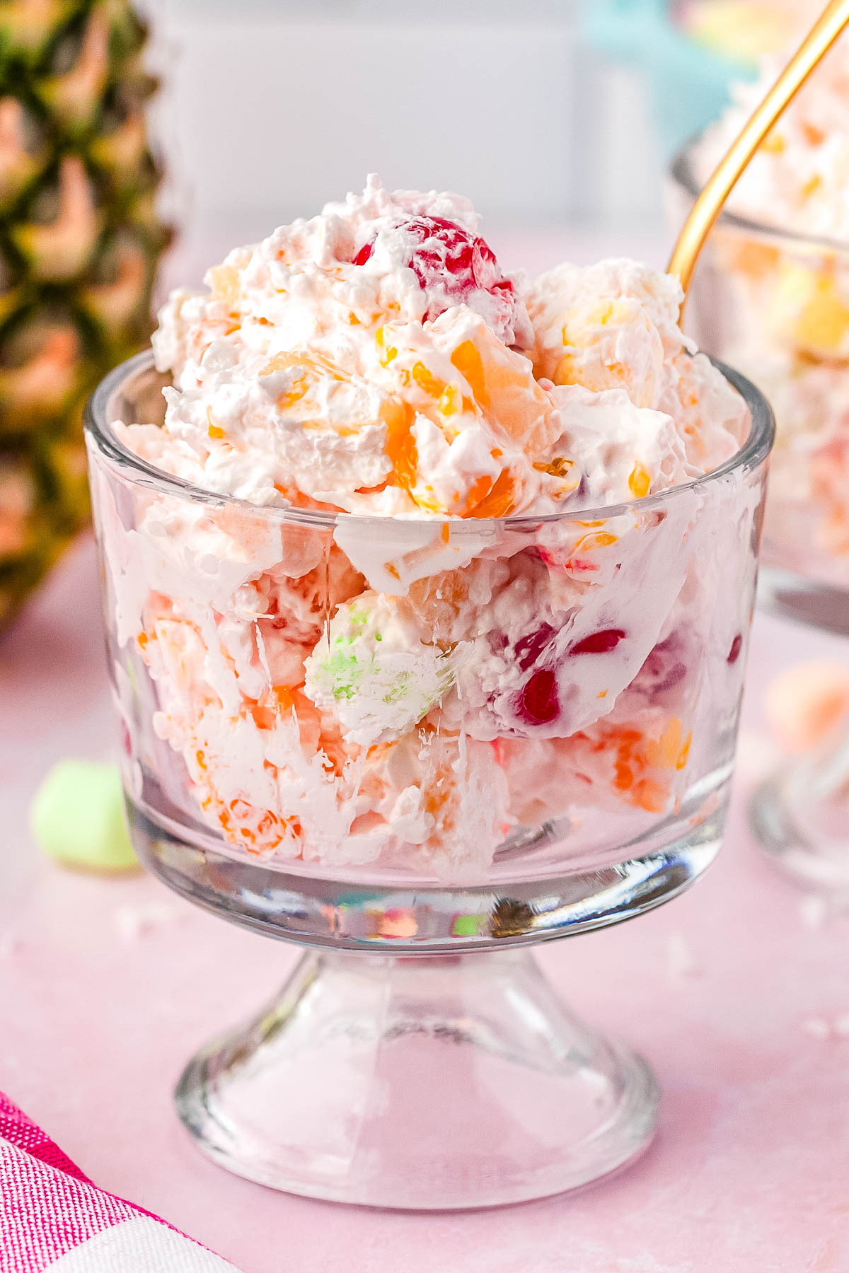 Ambrosia Salad with Cool Whip in individual serving dishes.