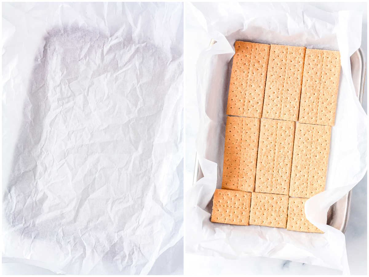Parchment lined baking pan with the first layer of honey graham crackers arranged across the bottom.